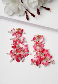 Hermosos aretes colgantes con flores rosas